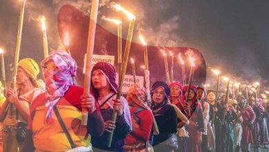 Protesters clash with police during torch rally in Manipur