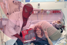 Meet Australia's real-life Spider-Man: Medical student visits sick children and gifts Nintendo Switches while dressed as the superhero