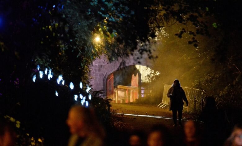 A woman walks on the grounds of Slane Castle during a Halloween festival called 'Puca' celebrating the Celtic