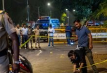 Forensic Experts and Police collect samples of evidence from the spot where unidentified assailants fired at Tiger Shroff