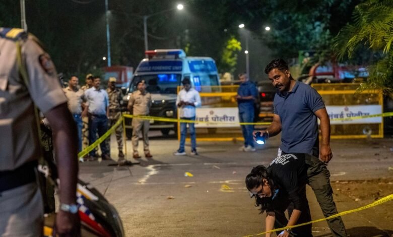 Forensic Experts and Police collect samples of evidence from the spot where unidentified assailants fired at Tiger Shroff